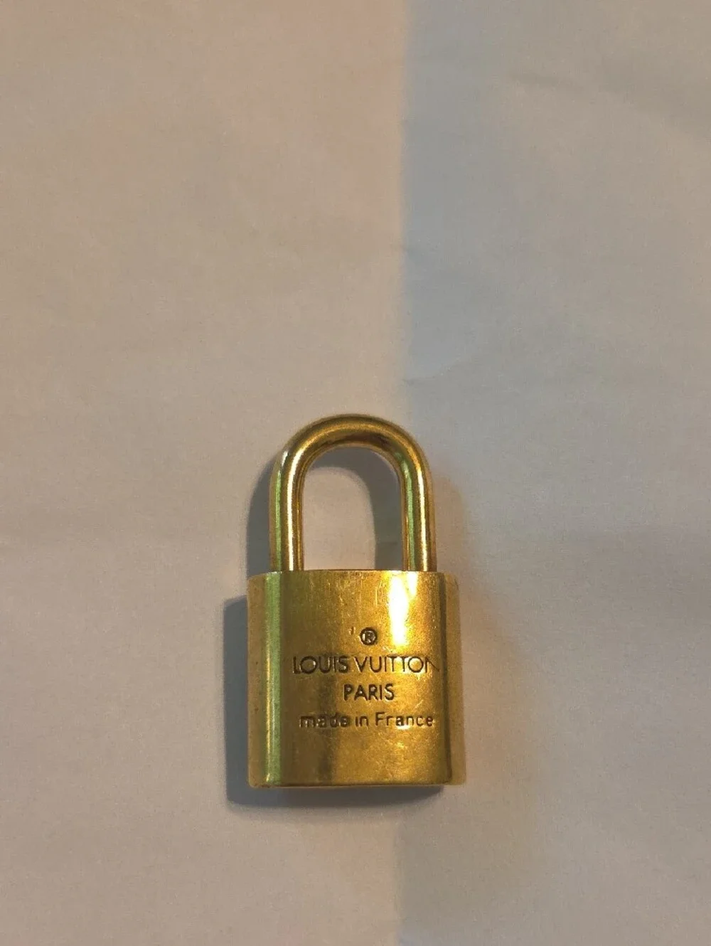 Louis Vuitton Gold-Tone LV Lock Charm